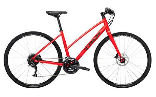 Red Trek hybrid bike with disc brakes used for cycling tours in Slovenia